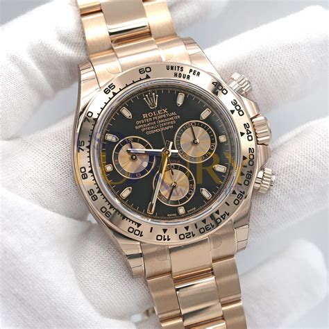 rolex daytona gold black dial.